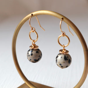 Gold earrings with a Dalmatian jasper gemstone 