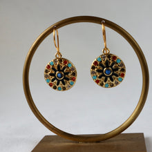 Load image into Gallery viewer, Gold earrings with colorful stones on a bronze stand against a white background