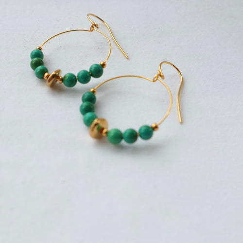 Green gemstone gold hoop irish earrings