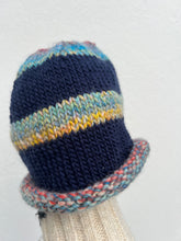 Load image into Gallery viewer, Knitted multicolored beanie on a white background