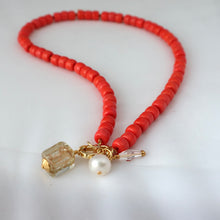 Load image into Gallery viewer, Orange beaded necklace with gold charms 