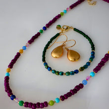 Load image into Gallery viewer, Jewelry set with beaded necklace, bracelet, and earrings on a white background
