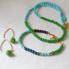 Load image into Gallery viewer, Jewelry set with turquoise and green beaded necklace, bracelet, and earrings on a white background