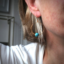 Load image into Gallery viewer, Person wearing gold hoop and turquoise earrings 